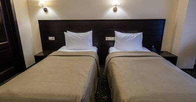 Стандартный однокомнатный двухместный номер с 2 односпальными кроватями